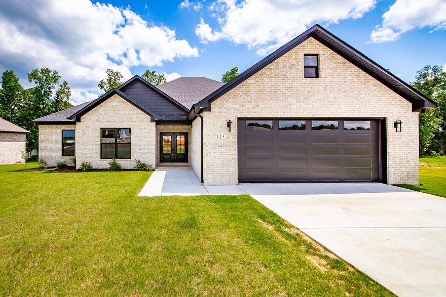 Beautiful new construction home in Hidden Valley Estates! Hardwood look tile, quartz countertops, custom cabinets, custom trim, beams and shelves, to match the custom vent-hood, HUGE custom tiled shower, large pantry, large closet and stand alone soaker tub in primary that connects to the laundry room! NextGen water proof wood floors throughout! Living room boasts brick fireplace & coffered ceiling in living room, large covered back porch, soffit/eave can lights, oversized garage and tons more. Call today! This one won't last long!