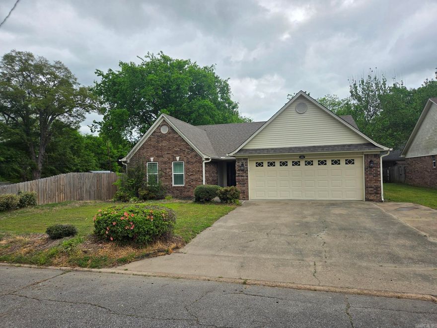Very nice 3 bed, 2 bath with bonus & 2 car garage recently updated maintenance free home in downtown Searcy! This house was remodeled recently in 2022 & updates include NEW water heater, HVAC, windows, ceramic tile wood plank look floors, stove, dishwasher refrigerator, sinks, faucets, lighting, gutters, French drains, wood privacy fence, extra parking, garage motor, etc. It also has several walk-in closets, bay window, trey ceiling in Living room & dining area, gas log fireplace, LED accent lights, crown ceiling molding in all rooms, bonus room that could also be an office, game room or a 4th bedroom if doors & closet were added.