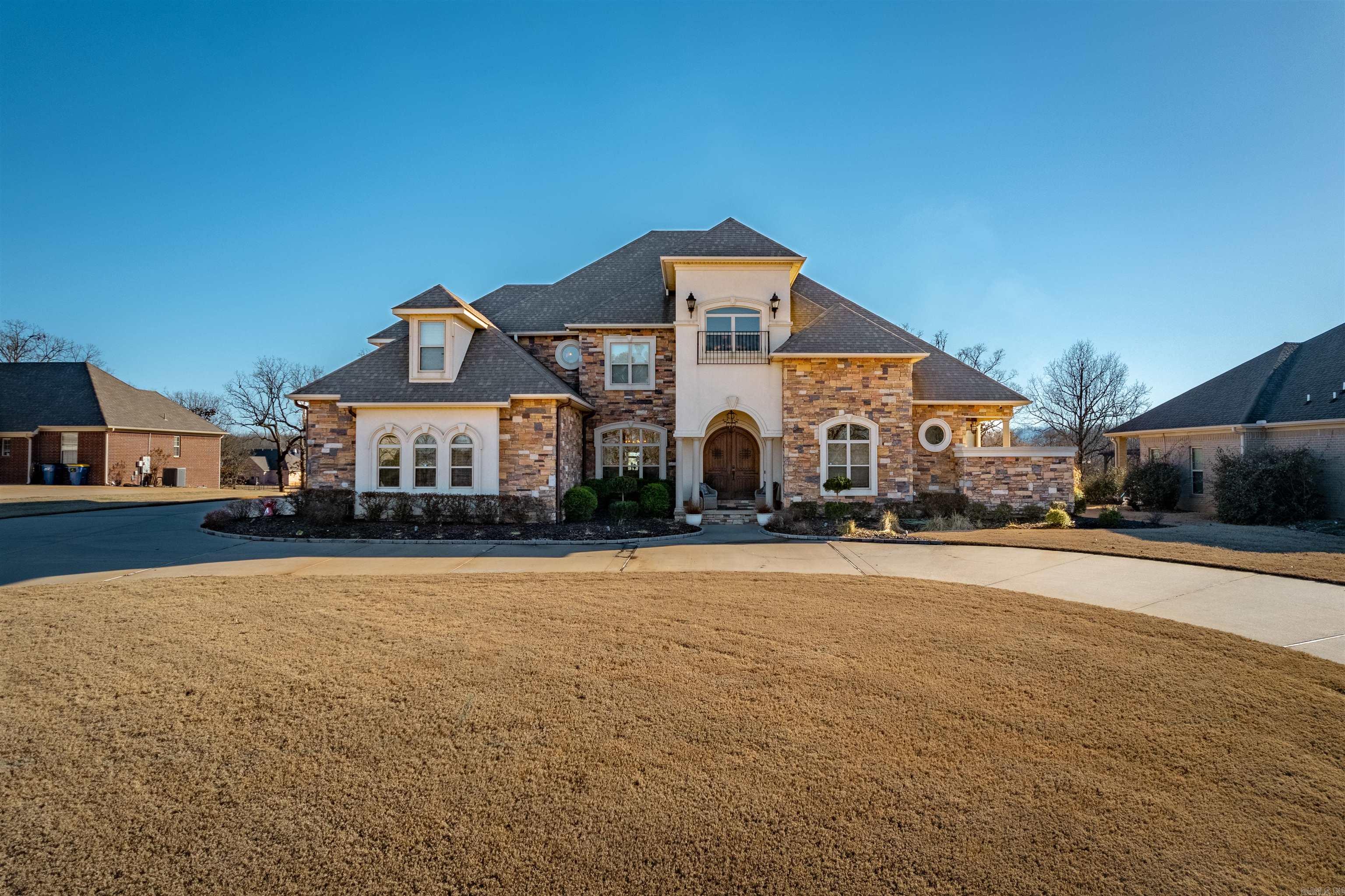 Very unique beautiful home on Greystone golf course! 5drm or 4bdrm w/bonus room 4 & 1/2 bath, breath taking views of nice private pool, golf course and lake! Features include, completely private master suite downstairs, 3 master suites upstairs w/private bathrooms & additional room could be bdrm #5, bonus room, play room or your preferred us! Large private office with lots of beautiful built ins & coffered ceiling! Separate formal living room w/gas fireplace, formal dining room, 2 hearth rooms w/gas log fireplace open to very nice kithcen w/quartz countertops, gas stove, double wall ovens, warmaing drawer, farm sink, microwave, dishwasher, & newer refrigerator that does convey! This home will give you everything you need without having to leave home! 3 car side entry garage! A one of a kind Home! AGENTS SEE AGENT REMARKS!