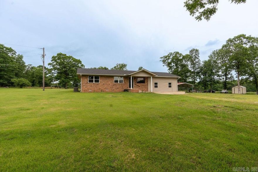 This charming four-bedroom, two-bathroom home has been beautifully updated. It features a new roof, flooring, paint and trim, ensuring a fresh and modern interior. New windows fill the space with natural light, offering beautiful views of the surrounding landscape. The bathroom has new showers and plumbing. The kitchen is functional and stylish, perfect for both everyday living and entertaining. Outside, a newly installed chain link fence, offering security and a safe play area for children and pets. Storage buildings provide additional space for tools, equipment, and recreational items. This home is move-in ready with its modern updates and idyllic country setting. It’s perfect for families or those seeking a peaceful retreat with all the comforts of contemporary living. Don't miss the chance to make this your new home in the country.