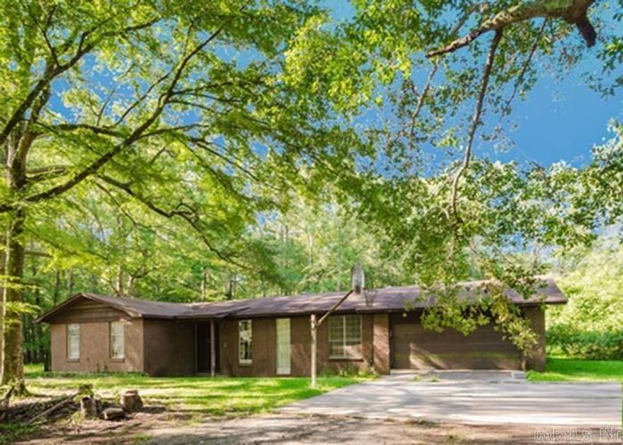 Exciting opportunity to purchase this four bedroom brick ranch on 2.5 acres. Mature trees and plenty of space. Two car attached garage. Home has had some updates in the past but has had deferred maintenance and will need some work. Near all conveniences. RESERVE AUCTION PROPERTY- Property sold “AS-IS” without contingencies, repairs, warranties, guarantees or representation as to listing accuracy, property information, photo or other depiction included or described herein. Inspect before bidding.