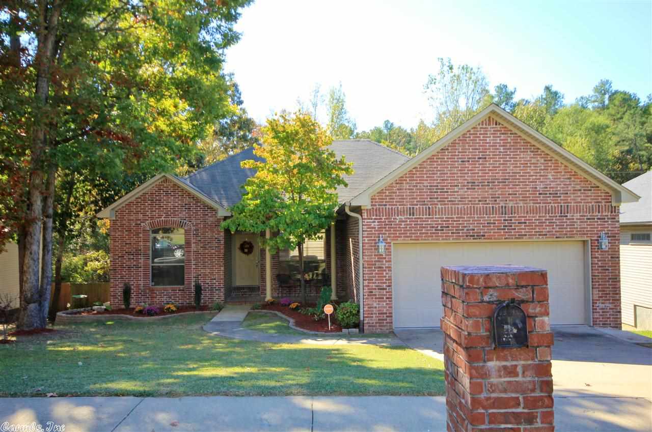 Wonderful One Level in West Little Rock! Spotless Condition with Bamboo Flooring in all rooms except Kitchen and Baths (tiled). Fresh, Neutral Paint Throughout. Updated Light Fixtures. 9 foot Ceilings. Open Floorplan. Master Bedroom has Huge Walk in Closet. New Deck (May 2014) overlooks Wooded Area & Privacy Fenced Yard. Bricked Front Porch. Beautiful new Landscaping in Front Yard. Excellent Street Appeal. New Roof (Oct. 2011). New Oven (Oct. 2014). Quality, charm and great natural light. Perfect!