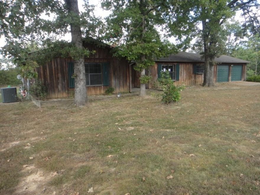 Country setting cedar home. Acreage. Spacious, open floor plan. Large front yard and Large back deck to sit out and enjoy nature. 2 car garage. Property is sold "As-is" and "Where is" with no warranties expressed or implied. This property is now under auction terms. This property is subject to a 5% buyer's premium pursuant to the Auction Terms & Conditions (minimums may apply). This is a reserve auction and all offers are subject to seller approval.