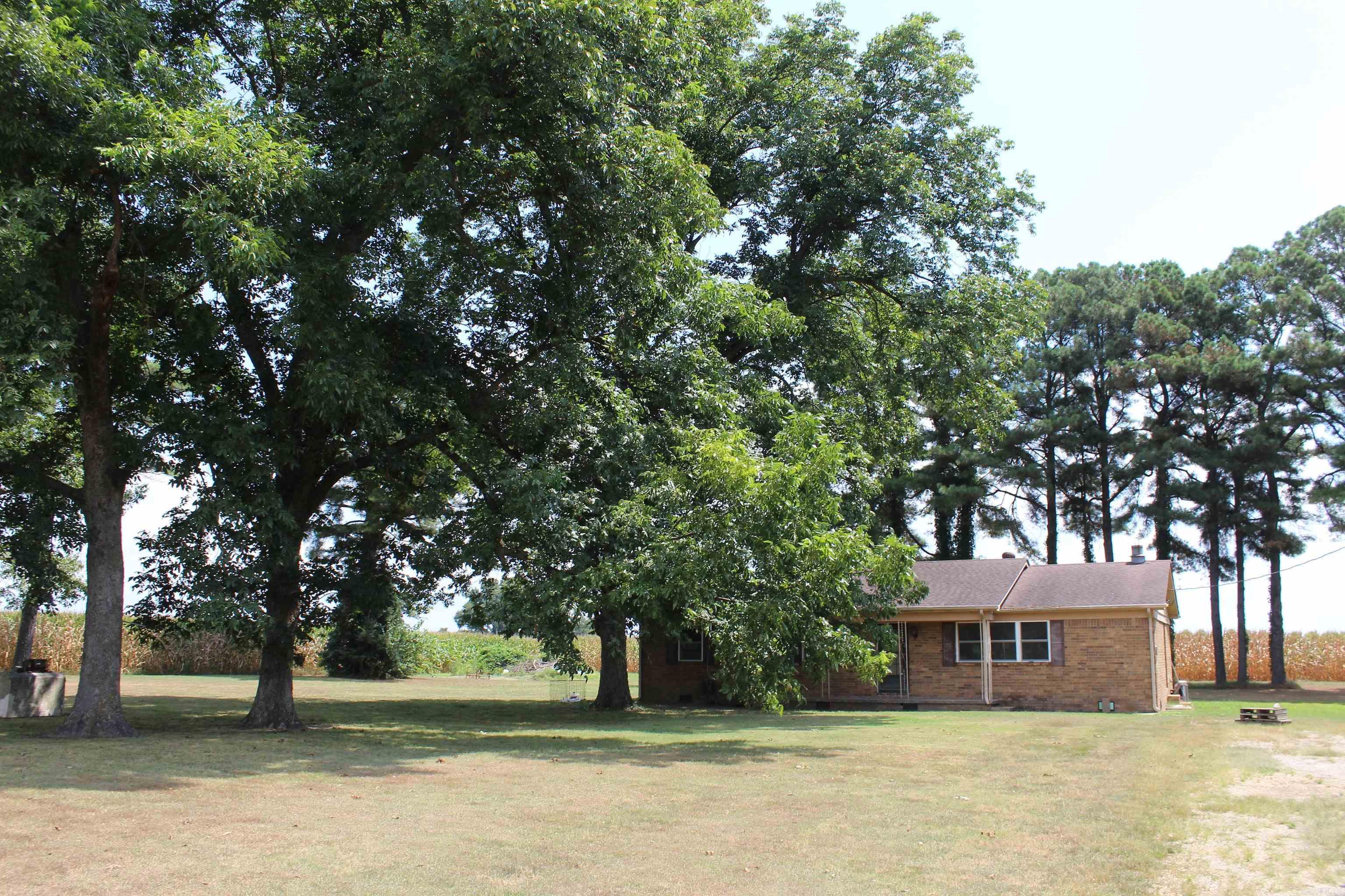 Charming 3 bedroom, 2 bath brick home situated on 1 peaceful acre just outside of town! With 1,537 square feet of living space, this home features a spacious living room, a cozy breakfast area perfect for morning coffee, and a functional layout with plenty of natural light. The solid brick exterior offers low maintenance, and the large yard provides room to garden, play, or relax under mature shade trees. Enjoy the quiet of country living while staying conveniently close to town. Donāt miss out on this well-built home with endless potential! Agents See Remarks.