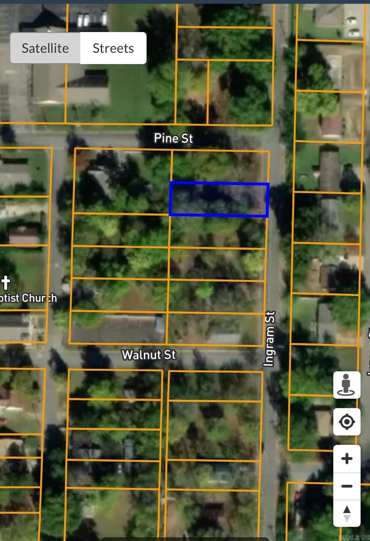 Nice corner lot located in the city limits of Conway Ar. The land has a well-maintained lawn and mature trees.