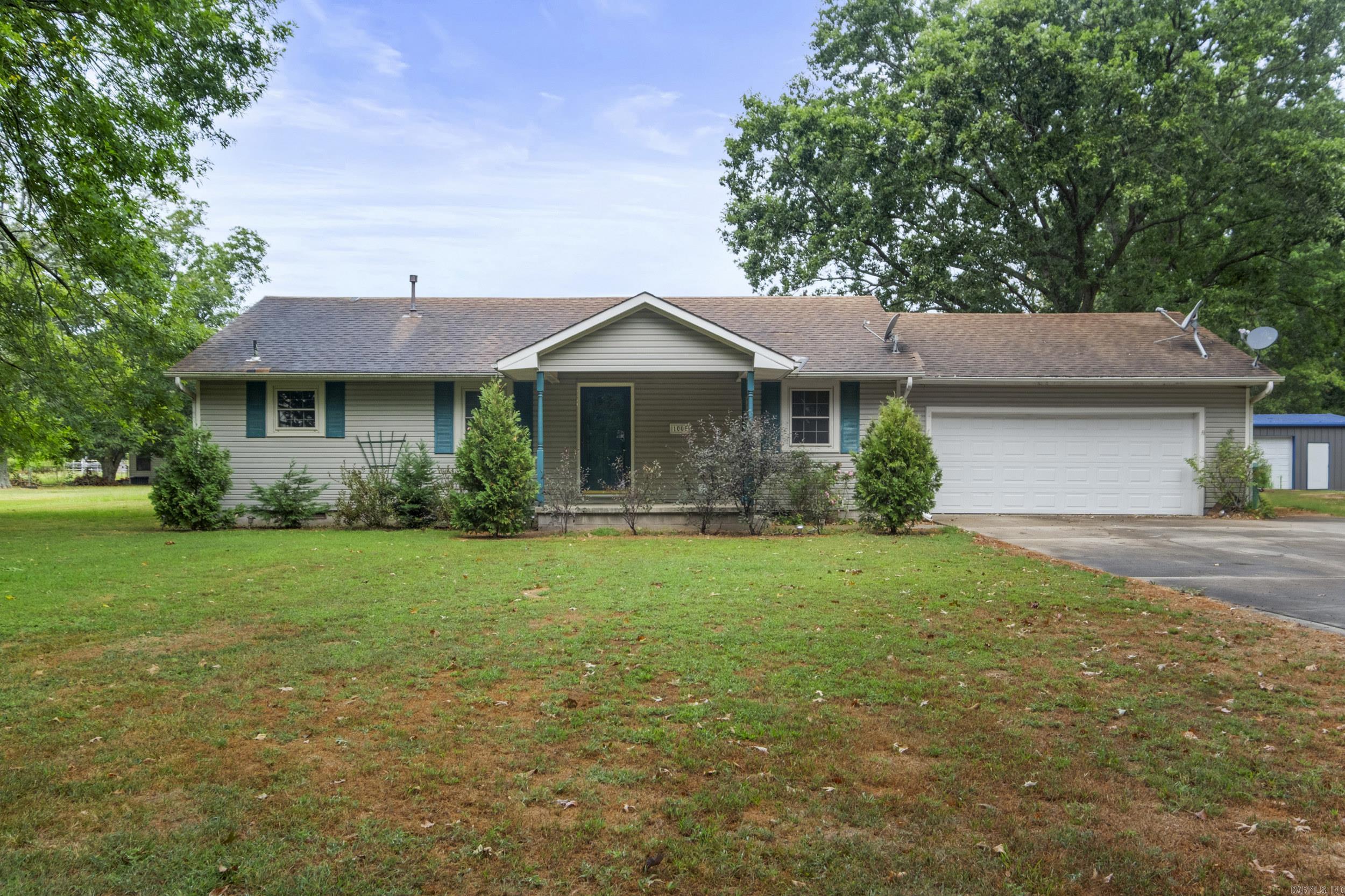 Fixer-Upper with Space & Potential! Sitting on 1 acre in a quiet rural setting, this property offers plenty of room to make it your own. The home features a two-car garage with a long driveway, which was expanded around the house in 2012. Two bonus rooms were added off the garage in 2012 and updated with heating and air in 2014... ideal for work, hobbies, or play. The home also has newer windows. Major updates include a new HVAC system and an updated water line from the street, both completed in 2024. With mostly cosmetic updates needed, the possibilities are endless. Donāt miss outācall today for an appointment! Sold AS-IS