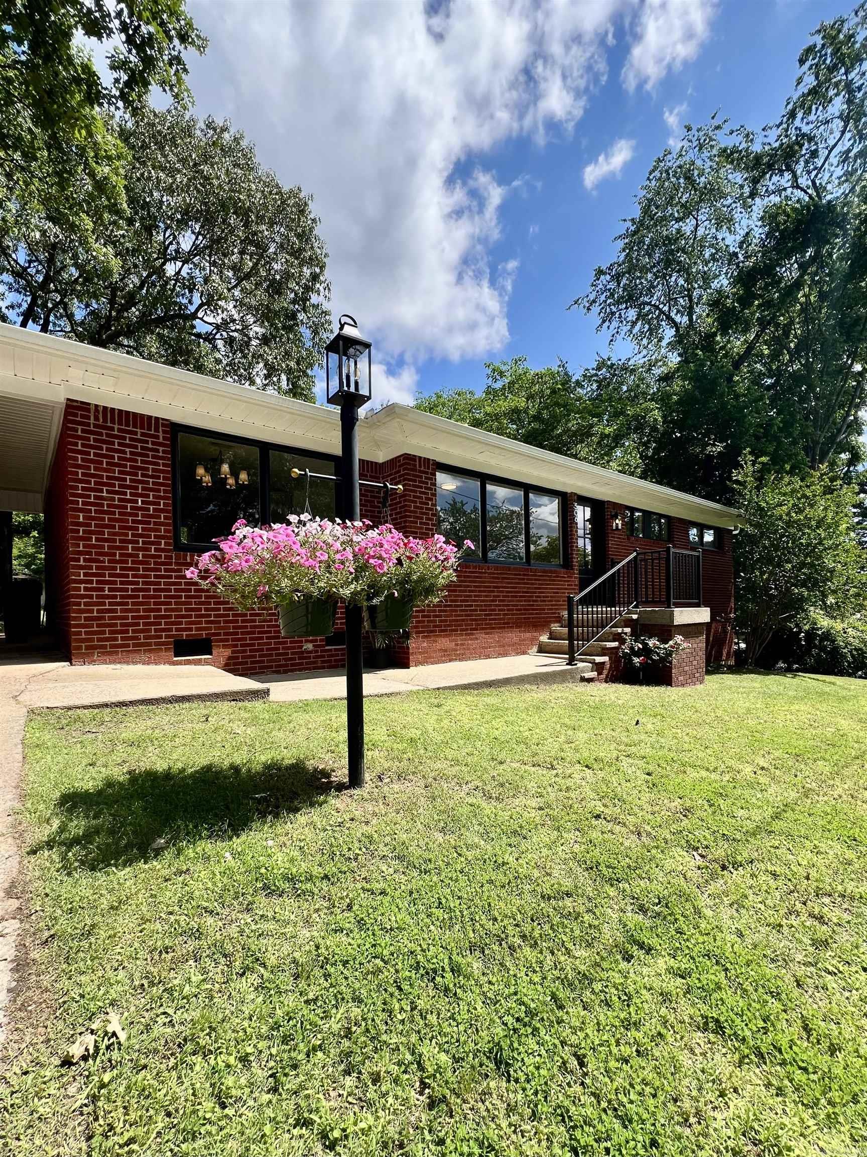 Beautiful home in the heart of Heber Springs! This gorgeous home has just undergone a thoughtful & detailed restoration & is begging for its new owner. Nestled on 2 mature city lots just 1 block from school & 1.5 mi to Sandy Beach. Inside you will find plenty of room w/ 3 beds/2 baths, an office & a large walkout basement. New roof, refinished hardwood floors, & kitchen just to name a few! Move in ready!