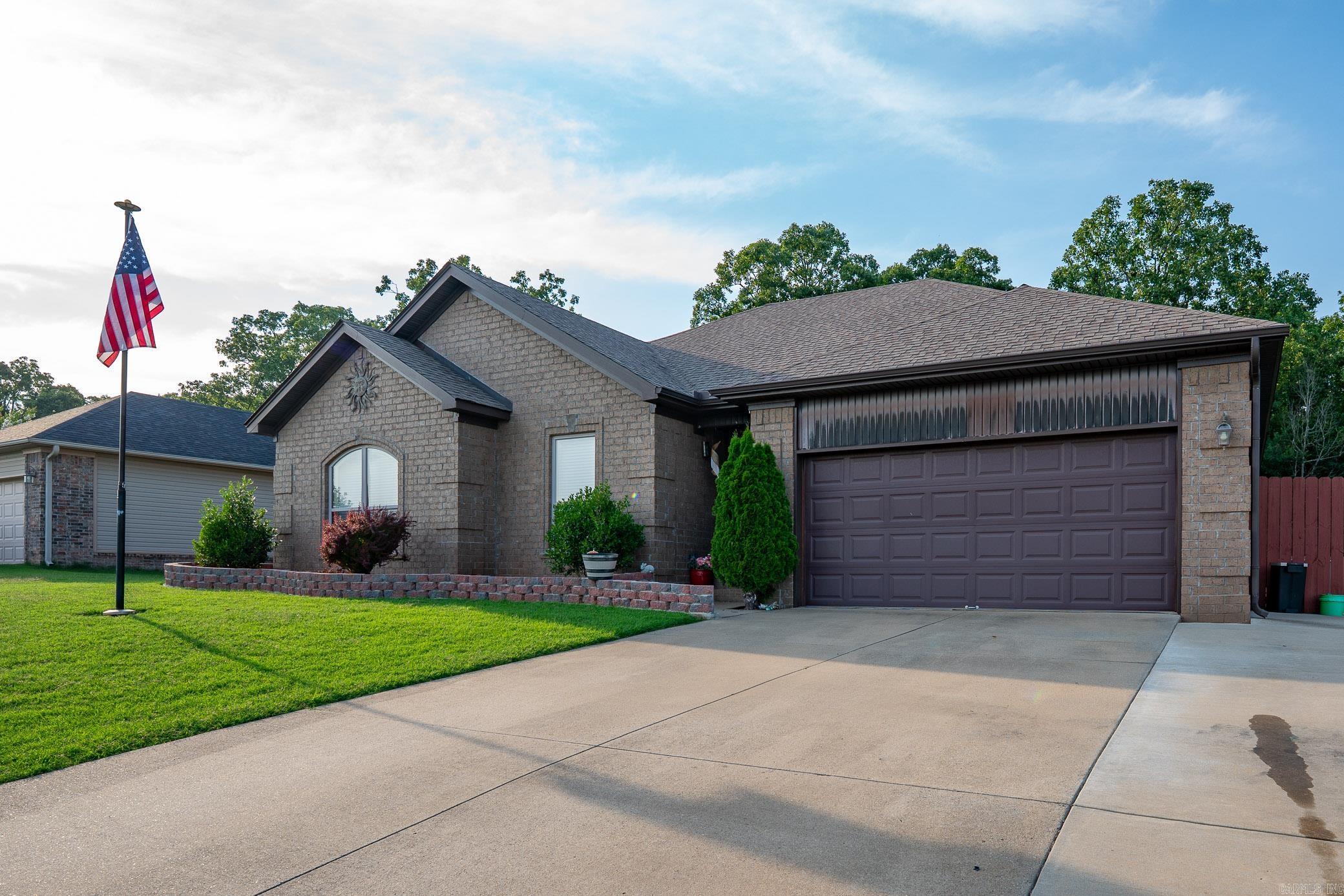 Discover comfort, space, and convenience in this 4 bedroom, 2 bathroom home nestled on a large, nearly half-acre lot in a quiet and desirable neighborhood in Austin, AR. Step inside to find an inviting, open-concept layout perfect for both daily living and entertaining. The spacious living area flows effortlessly into a well-appointed kitchen, offering ample cabinetry, a breakfast bar, and generous counter space. The split-bedroom floor plan ensures privacy, with the primary suite featuring a walk-in closet and en-suite bath. Three additional bedrooms provide flexible space for guests, a home office, or a growing family. Enjoy the outdoors year-round from your screened-in sunroom overlooking the expansive, fully fenced backyard, ideal for kids, pets, or hosting gatherings. The oversized lot offers endless potential for gardening, outdoor fun, or future additions. Additional highlights include: Attached garage and extended driveway with room for extra parking Quiet street with no through traffic Convenient access to schools, shopping, and Hwy 67/167 Don’t miss your chance to own this home with space to grow, schedule your private tour today