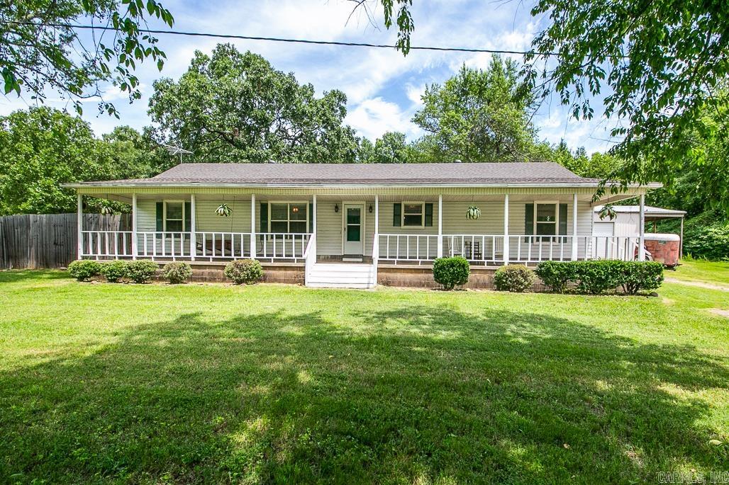 Welcome to your perfect country retreat! This charming 3-bedroom, 2-bathroom home offers 2,100 sq ft of cozy living space. Enjoy relaxing on the long front porch, ideal for morning coffee or evening sunsets. Inside, you'll find laminate flooring throughout, with tile in the wet areas for easy cleaning. The eat-in kitchen features a gas range, perfect for home-cooked meals. A spacious bonus room offers endless possibilities ā think family room, office, or playroom. Outside, there's a big shop (shop is AS IS) with covered RV parking and a large storage shed for all your tools and toys. This home combines comfort, functionality, and rustic charm. Come see it today!