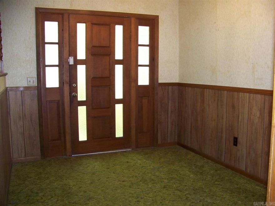 A lot of livin' to do and lots of room for it in this spacious home.  2 living areas, separate dining room, office, large laundry room and sun porch.