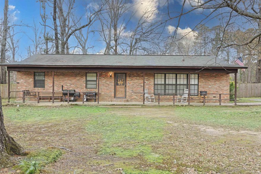 Welcome to this well-maintained 4 Bedroom, 2 Bath, brick home offering almost 1800 sq. ft. of comfortable living space on a spacious corner lot just under half and acre in the highly desirable White Hall School District. This home features a functional layout with a large kitchen highlighted by a huge breakfast bar with built-in storage and a hidden pantry, perfect for everyday living and entertaining.  Recent updates include all new flooring throughout the home, and beautifully updated bathrooms, giving the home a fresh, modern feel.  Major systems have also been updated with the roof replaced in 2019 and a new HVAC system installed in 2022, providing peace of mind for years to come.  Two bedrooms include custom built-ins, ideal for a home office, craft space or additional storage.  The side entrance leads into an oversized utility room with plenty of space for organization and convenience.  Step outside to enjoy the privacy fenced backyard complete with two powered shops-one 12x20 and an additional 18x27 on a concrete slab with roll-up door.  The backyard also includes a chicken coop, concrete patio and plenty of room for a garden!  Call today for your private showing!