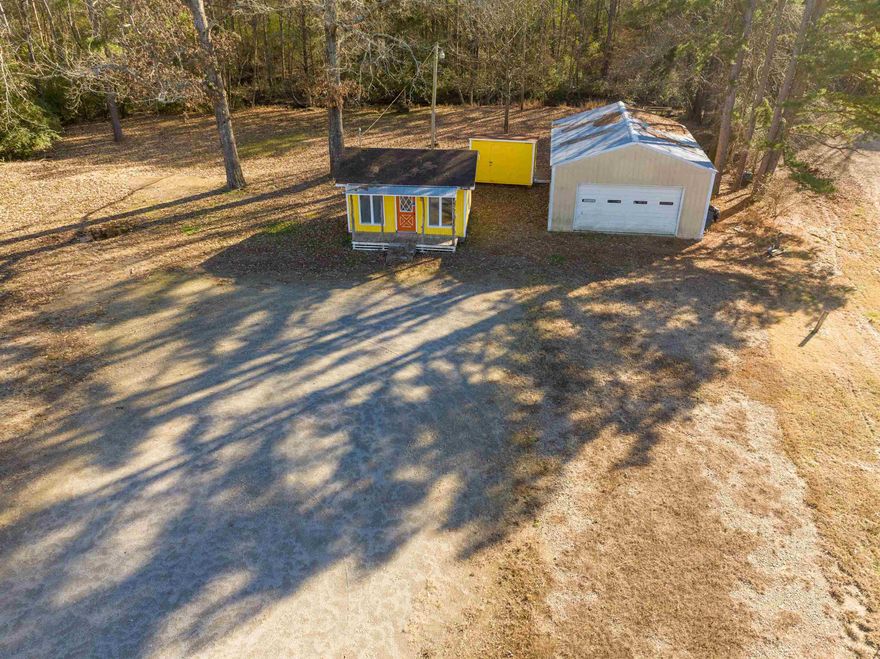 High traffic count location for your new business.  Formerly a landscape company, you can open a similar business or start a new one.  Over 1.18 acres that includes 2 small buildings.  Schedule a personal tour to explore this location for your new business.
