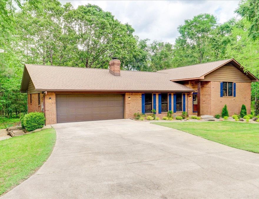 Charming home! Scenic with privacy and versatile living space.  This 3 bd, 2 ba well-maintained home offers excellent curb appeal and a spacious open-concept floor plan. Living room has vaulted ceilings, wood beams, and a cozy fireplace- perfect for everyday living and entertaining. The kitchen provides ample cabinet and counter space.   Primary bedroom features a large soaker tub. Lower level has an additional living space that could be a living space with it's own entrance and driveway.   The large, screened-in porch overlooking a wooded backyard is an ideal retreat for enjoying nature and total privacy, with no neighbors in sight! The small fenced-in yard can be used for pets or gardening.  Additional highlights include:  Generous laundry room with half bath.  Extensive storage throughout, including the basement.  Workshop space in the garage.  Recent investment in French drains for drainage improvement.  New AC in 2018 and new roof in 2022.  And more!  Located near the Danville entrance - easy access in and out of the Village! Agents - see Docs for updates since Dec 2023. Schedule showings through Showing service.