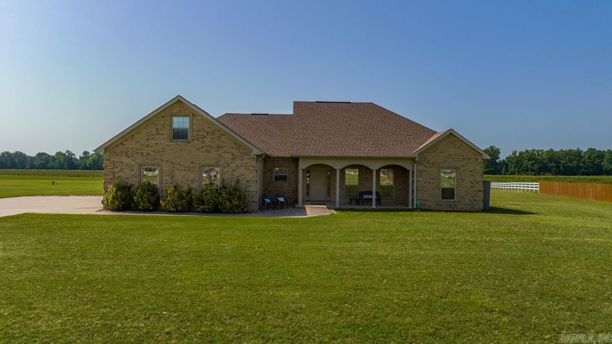 Stunning on Smarty Jones!  Welcome to your retreat from the city that is just minutes away!  This executive home was custom built with energy efficiency in mind, as well as entertaining.  The open concept living space allows for easy flow between the kitchen, dining room, and the main living space.  Working from home at your equestrian retreat is a breeze in the bonus room that could be either a fourth bedroom, office, game room, or movie room!  Have plenty of items that need to be stored?  The storage in this house is purposeful and plenty, with closets galore along with ample attic storage.  The covered patio and front porch make ideal locations for morning reflection and coffee as well as afternoon or evening cocktail hours with friends!  This home is truly a must see, the gated community with its equestrian features are an added bonus!  Don't miss the whole home water filtration system that conveys with the property!