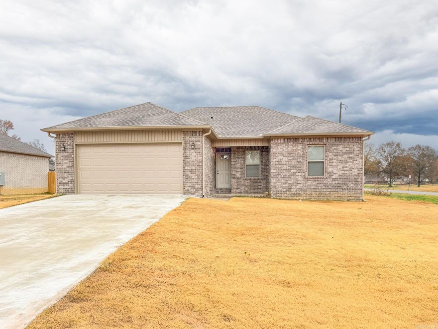 Beautiful New Construction! This home offers 1333 sqft, with 3 bedrooms and 2 bathrooms. Walk in the front door to enjoy this stunning open floor plan. The kitchen boosts beautiful granite countertops and ample storage. Built on a large corner lot. This home is conveniently located near schools, shopping, and restaurants.