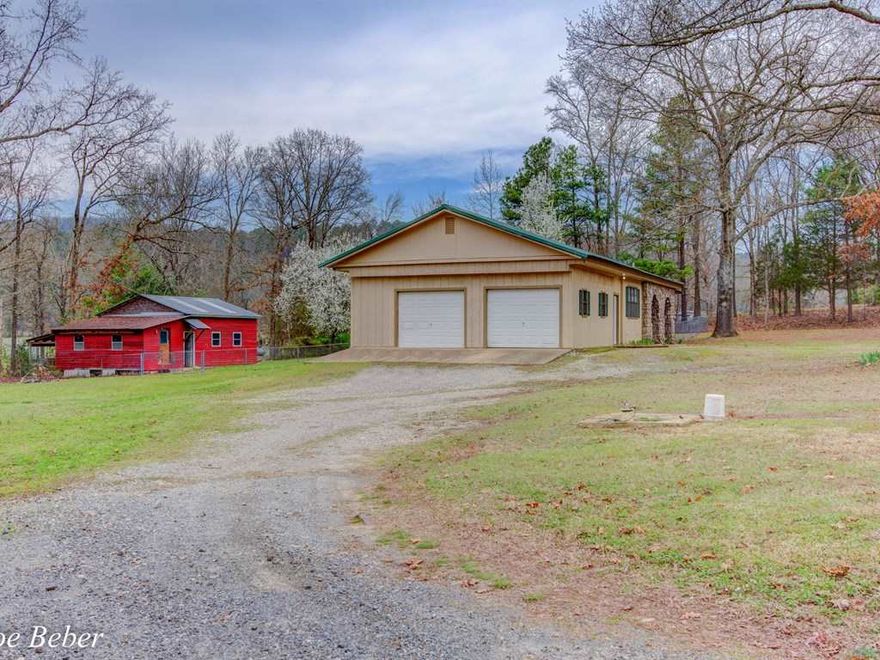 With Lake Ouachita just down the road, this home is perfect for the outdoor lover. Recently remodeled kitchen, move in ready. Also has attached 2 car garage plus additional detached garage/storage building for all those boats, trucks, trailers and toys! Sits on one acre with fence in back for kids or pets. Consider Rural Development loan with no down payment for qualified buyers who don't own another home. Home Warranty included.