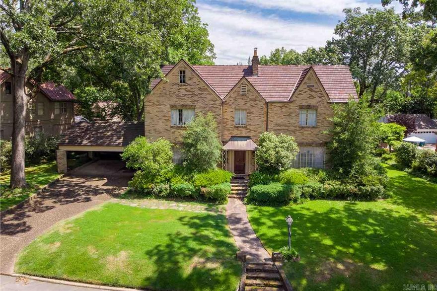 Beautiful home with extraordinary potential.  Outstanding Architectural lines and wonderful proportions. Formal dining, kitchen and breakfast adjacent Large formal living and cozy den/bedroom on the main level. Master up with 2 additional bedrooms.