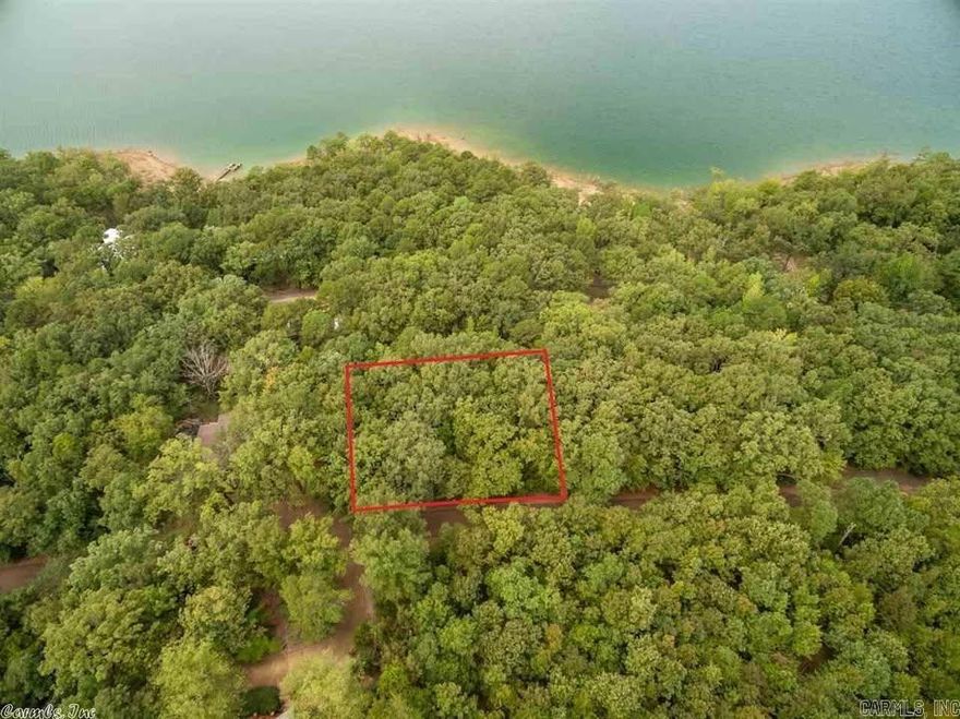 Beautiful Area Beautiful Lake Has it all here on Eden Isle including, Golf Course, Pickle Ball, Tennis, Fishing Lakes, Boating and skiing lake, Red Apple Inn, Marinas, you name it its here. More fun than you can imagine. Always wanted a lake house now's your time to build one.  Lot or Custom Build Just Call 501-650-4180 Dillon Homes & Real Estate, Inc.