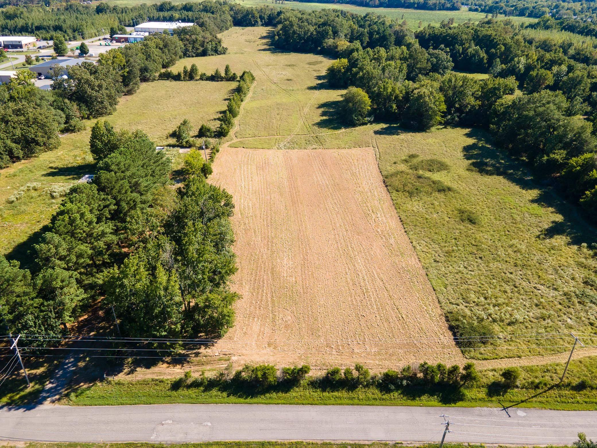 Opportunity awaits with this level 2.2-acre lot close to the interstate and located in an established industrial area. With no restrictions, the possibilities are wide open-ideal for industrial or commercial use. Whether youāre looking to expand your business, start a venture, or secure land for personal use, this lot is ready for development. Conveniently located near Lake Conway with a Game and Fish public boat access to the lake just right down the road. Bring your vision and make it happen-this property is a blank canvas with unlimited potential.
