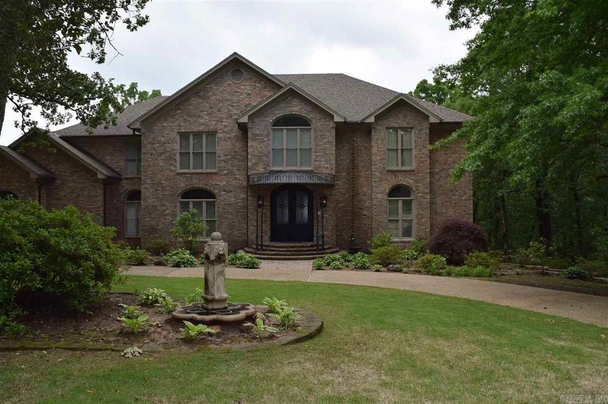 Exquisite home situated in elegant park like setting w/every extra imaginable. Grand marble foyer, magnificent curved staircase. Formal living & dining spaces. Chef's kitchen, granite countertops & island, separate kitchen dining area, screened porch, gigantic pantry spaces. Massive den w/large European style fireplace, large wet bar room, additional eating nook. Built-ins galore. Glorious window treatments. Multiple porches, decks, patios, huge in-ground salt swimming pool. See Agent Remarks!