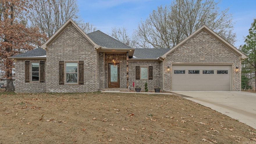 Move-in ready 4 bed, 2 bath home built in 2023 in a quiet cul-de-sac. This beautifully maintained property features an open-concept layout with vaulted ceilings and neutral finishes throughout. The living room opens into a stunning kitchen complete with quartz countertops, a large island with sink, stainless steel appliances, under-cabinet lighting, and a spacious walk-in pantry. The split floor plan provides privacy, with the primary suite showcasing a spa-style bathroom with dual vanities, a freestanding soaking tub, and a walk-in tile shower, and generous walk-in closet. Extra large laundry room for added convenience. Outside, you’ll find a fully fenced backyard and a covered porch ideal for relaxing or entertaining. Additional highlights include a brick exterior with covered front entry, an attached two-car garage, luxury vinyl plank flooring throughout with no carpet, LED recessed lighting, smart touch Wi-Fi enabled light switches, large windows for natural light, and ample storage. Located just minutes from town while still offering a peaceful setting, this like-new home offers modern finishes and thoughtful design throughout. *storage building does not stay*