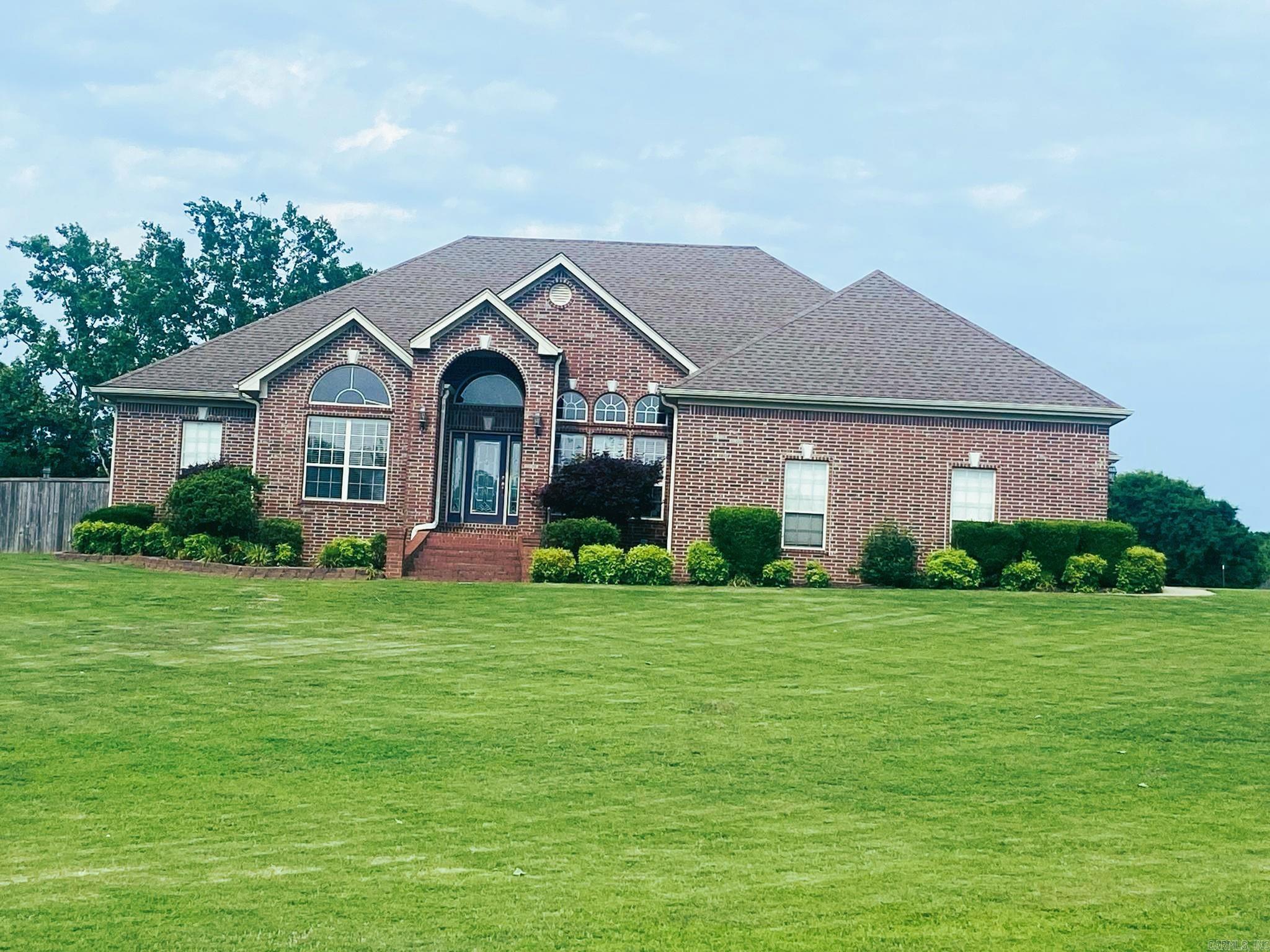 Horse lover nirvana with a wonderful home and pool for the humans! Well appointed 3 bedroom 2.5 bath has an exceptional split bedroom floor plan! Huge living room with tray ceiling and fireplace that overlooks the back porch and pool! Fully equipped kitchen with pantry cabinet, plenty of cabinet space, a breakfast bar and Corian countertops! Large dining area for big family gatherings yet a cozy breakfast nook when needed! Ginormus primary bedroom with large bath with double sinks, separate shower and tub, and bonus feature of sound insulated interior walls! Large walk-in closet with built-ins is the size of most bedrooms! Split bedrooms 2 and 3 are also large with great closet space and lock off jack and jill bath! Great office space to work from home with lots of built-ins! Cowboy up outside with a 3 stall barn with tack/feed room, hay storage, and inside workshop! Fenced pasture for horses with an additional 3 acres that could be purchased for riding arena and pasturing for cows or horses! Located in the Benton School district just minutes from I-30! Additional Acreage available, please ask your agent for the details! Agents see Agen remarks for details.