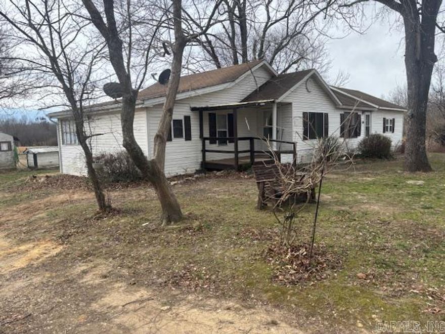 Quiet family home place on 12.80 beautiful acres more/less. Most of acreage is open meadows, with just small portion wooded. The original home was added on to 20+ years ago and includes: 2 beds/1 bath/kitchen/dining/laundry room/enclosed back porch.   Home and property priced to be sold "AS-IS" w/No Repairs, no termite contract.  The property has Mammoth Spring address but located near the Wirth community.