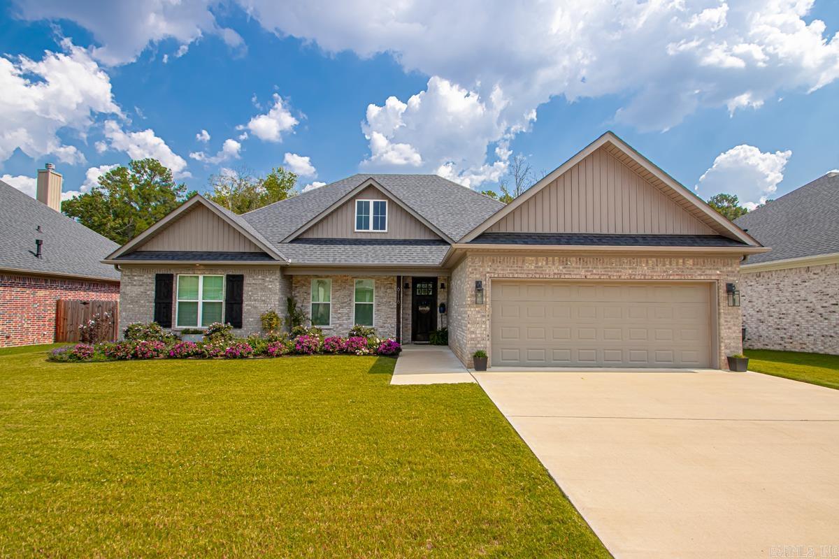 This lovely home sits on a spacious half acre lot. 2291 sq. ft. w/ 4 bd 2 b, immaculate landscaping. You will notice the attention to details and showstopper windows! The beautiful LVP floors flow seamlessly throughout the main living areas & pave the way to the impressive open living room and chefās kitchen. The living room is anchored by an alluring rock fireplace complete with gas logs & offers plenty of space for seating. Dream kitchen w/large island, quartz countertop flanked by gorgeous modern light fixtures, stainless steel appliances, a gas stovetop & more cabinetry than you can imagine. The dining nook has shiplap walls surrounded by sunlight & overlooking the expansive backyard. Nice Master bedroom/ bath w/ large shower, extensive tile work, his/her divided sink areas, granite countertops & modern fixtures. Huge walk-in closet opens to laundry room w/ sink & extra storage. Split floor plan w/ 3 additional bd 1 hall bath, nice sized closets & like new carpet. Large covered back porch w/ gas fireplace with TV hookups overlooks massive backyard. Perfect spot for morning coffee or watching the game. Lots of hummingbirds & occasional deer! Brand new 16x12 storage building.