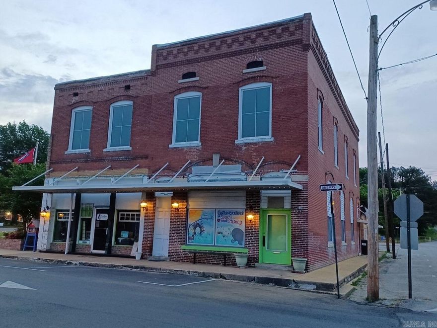 Two historical buildings located on Main Street in downtown Harrisburg. 102 N. Main Street was built in 1896 and offers 1,200 square feet. A new roof was put on this building in 2016. 100 N. Main Street was built in 1898 and was originally a bank. The walk-in vault is still located inside the building. This building is 1,380 sq ft on the main floor and has as second floor with 2,000 sq ft. with a roof replacement May of 2022. This unfinished level could easily be made into a loft apartment. Both buildings have new windows with a lifetime warranty. This property is a perfect investment opportunity with a slice of history.