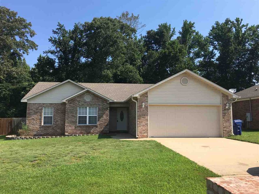 Gorgeous 3 bedroom and 2 Bathroom home with 2 Car garage. Home offers brand new floor in living room with new paint throughout. This is a MUST SEE!!!!