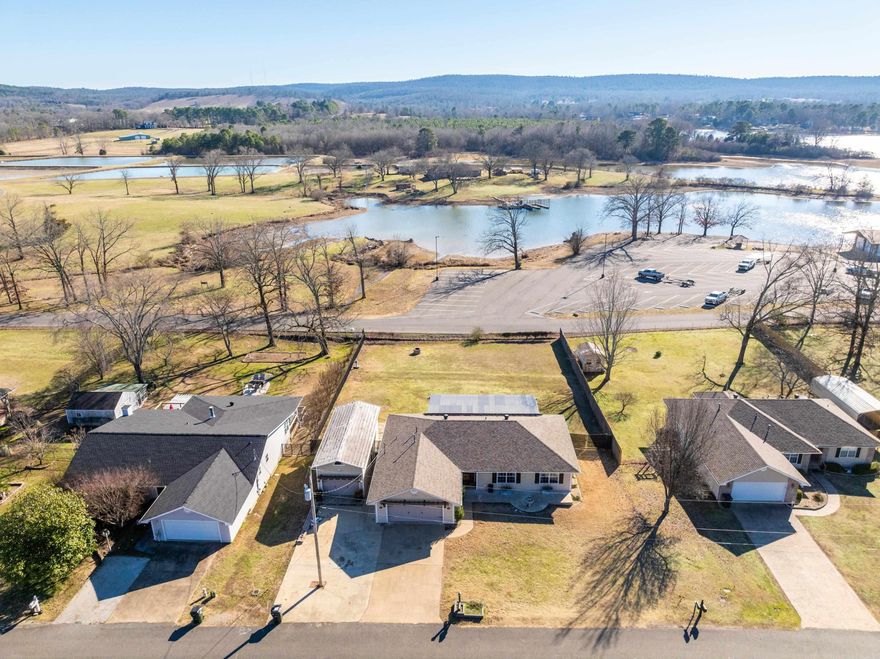 Fantastic Home for Rent in the Lakeside School District, located in the Hwy 290 Area.  It features Hardwood Flooring, Shaker Style Cabinetry, Quartz Countertops, a Fireplace, and a Covered Back Patio with HUGE Lake Views that you will Love!  This Charming One Level Home has Tons of Natural Light and you can Enjoy Lake Views from Every Room on the Back of the Home.  2 Car Garage PLUS a 12x20 Workshop or Boat Storage. Call Today!  This Property Adjoins the Road to the Fish Hatchery Day Use Area on Lake Hamilton. $2,000.00 Deposit.  Tenant is Responsible for All Utilities.