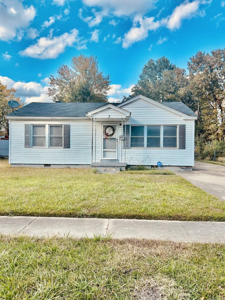 Great home with 2 living areas, spacious kitchen and large bedrooms.  Metal storage building with a large fenced in yard. Home has a newer roof and central heat and air.  This home is a fantastic investment opportunity!  Property is being sold "AS IS"
