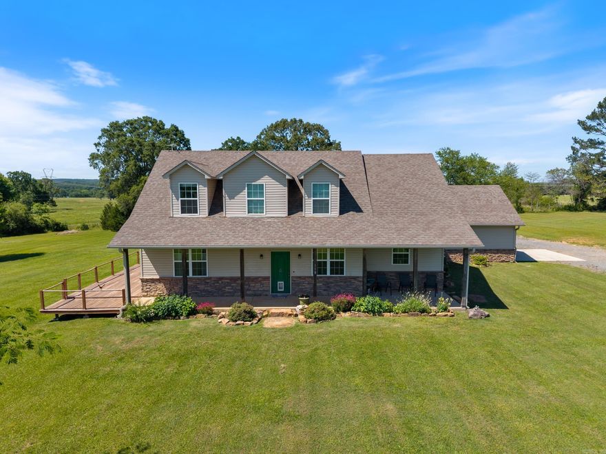 Charming Home on 3+ Acres—Convenient to Everything! This beautiful 3 bed, 2.5 bath home in desirable Hill Creek Estates sits on just over 3 scenic acres—perfectly located minutes from Conway, Morrilton, and Little Rock. Inside, the spacious living room boasts lots of natural light, a vaulted ceiling with balcony and a cozy wood burning fireplace. The chef’s kitchen features a ton of cabinets with undercabinet lighting and counterspace. Separate dining room is perfect for an office. The primary ensuite features tray ceiling, jacuzzi tub, double sink vanity, separate shower and large walk-in closet. Enjoy your morning coffee on the large front porch or relax on the private deck off the primary suite overlooking the manicured yard and beautiful fruit trees. Feel safe and secure during bad weather in the tornado shelter. Updates have been completed in the last few years including NEW LVP flooring downstairs, NEW carpet stairs/upstairs, NEW light fixtures, NEW appliances and more. See feature list for full list of updates. Kitchen refrigerator and Bose Surround Sound included! Escape to peaceful living without sacrificing convenience. Schedule your tour today! Agents see remarks