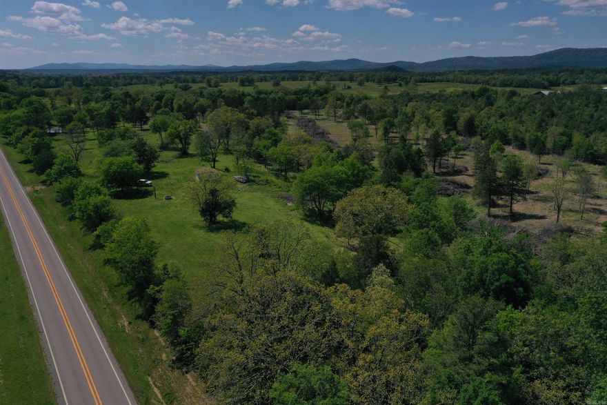 This Montgomery County acreage has great views and is in an even better location! The 11 +/- acres spans across rolling topography, with great views from the build sites along the hilltop. A water well is already in place, and power is available at the Highway. The cleared acreage is beautiful from front to back, and even has a pond. Along with being a beautiful build site, this property has an excellent location as well. Dragover Recreation area on the Ouachita River is just a few minutes’ drive down the county road, providing access to one of the most unique canoeing and fishing opportunities on the river. This section of the river offers a multiple hour float, that ends within walking distance of the parking area! The Ouachita National Forest is just minutes away as well, offering hundreds of thousands of acres of public land, with many great opportunities for hunting, fishing, hiking, and enjoying The Natural State. If you enjoy spending time on the lake, an access and boat ramp for Arkansas largest lake, Lake Ouachita, is just 15 minutes away.