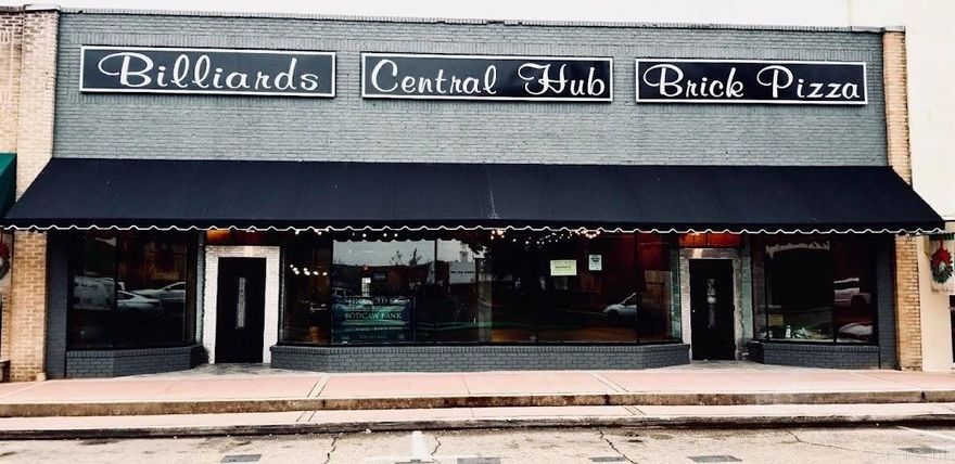 All possibilities.  This building includes two buildings that can be divided or kept as one. This is located in the historic downtown of Magnolia, AR. There are many options for new business in this great amazing community.