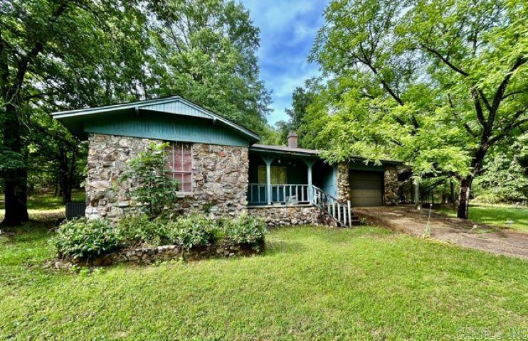 Location, Location, Location…Imagine the possibilities, and make your vision a reality on this beautiful 4 acre parcel right outside of the city. Minutes to all the amenities in Little Rock, yet tucked away in the country, surrounded by upscale housing and peaceful retreats. This 3 bedroom 1 1/2 bath house will need renovation but there is plenty of room to add or create your own piece of paradise. This home is being sold ‘As Is, Where-Is’ and all personal property currently inside and outside will need to be removed by new owners. This 1300+sq Ft Stone & Wood Home sits on 2-Two (2) acre lots but is being sold as one parcel. There are currently two well and septic systems on the property. An opportunity like is hard to find. Don’t miss the chance to be in one of the most desirable areas of Little Rock, and make your dream a reality! Bring your horses and chickens! ** Agents see remarks