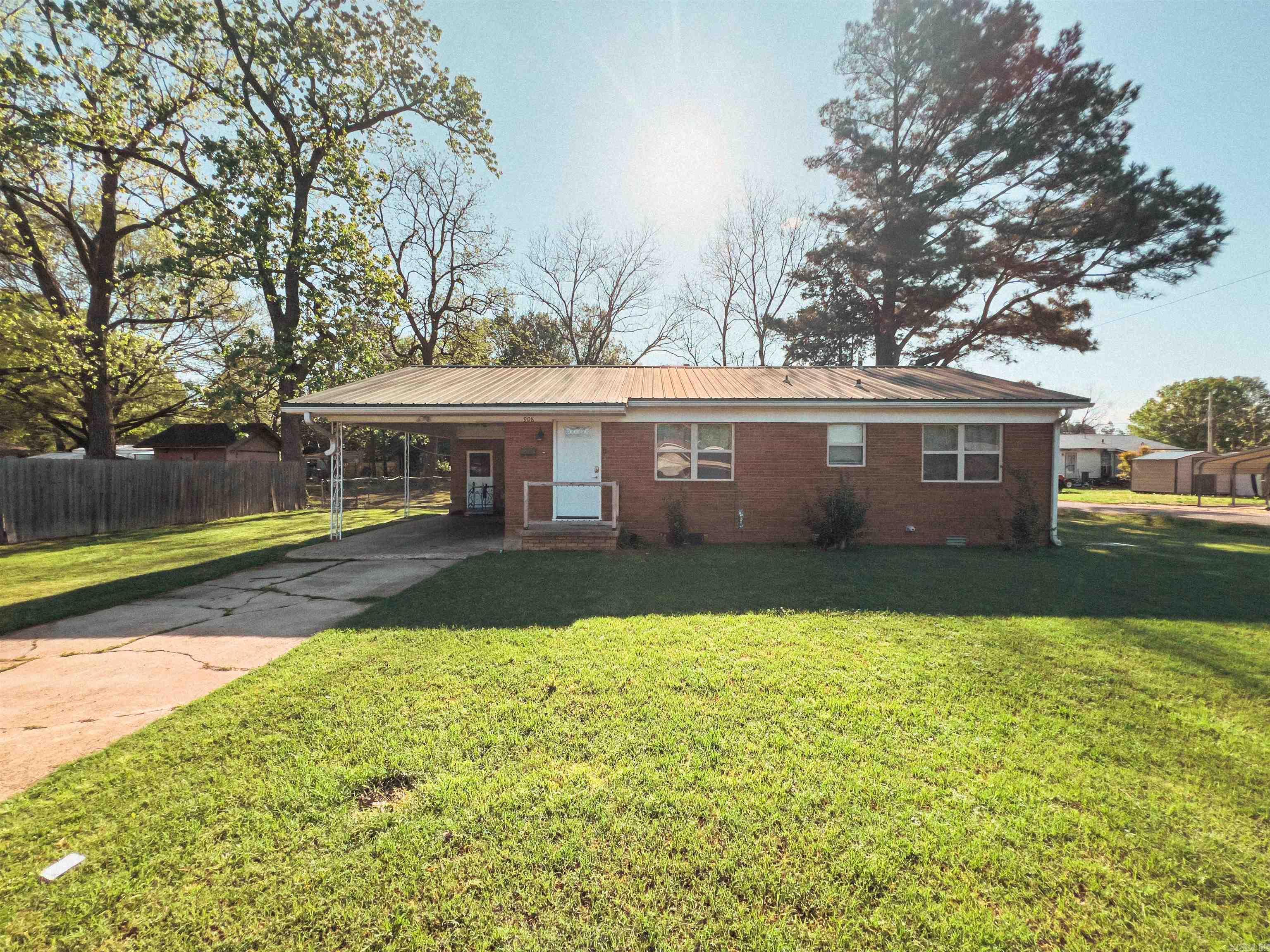 Welcome home to this super cute and budget-friendly 3-bedroom, 1-bath brick beauty thatās packed with updates and full of charm! Whether you're a first-time buyer, looking to downsize, or just want a cozy home with modern touches, this one checks all the boxesāand then some !Step inside and fall in love with the fresh, neutral paint that gives every room a light and airy feel. The brand-new flooring throughout adds a sleek and stylish touch, while updated cabinetry and modern appliances in the kitchen make it the perfect place to whip up your favorite meals. The bathroom has also been tastefully renovated! But thatās not all. This home is set up for low-maintenance living thanks to the metal roof and updated windowsātwo major updates that mean fewer worries and more time enjoying your home. Whether playing with the fam or hosting backyard barbecues, the spacious yard offers endless possibilities for relaxing or entertaining. Located right in the heart of town, you'll be just minutes away from shopping, dining, parks, and schoolsāeverything you need, right at your fingertips! This little gem is truly a rare find at this price point. Updated, adorable, and ready for new memories!