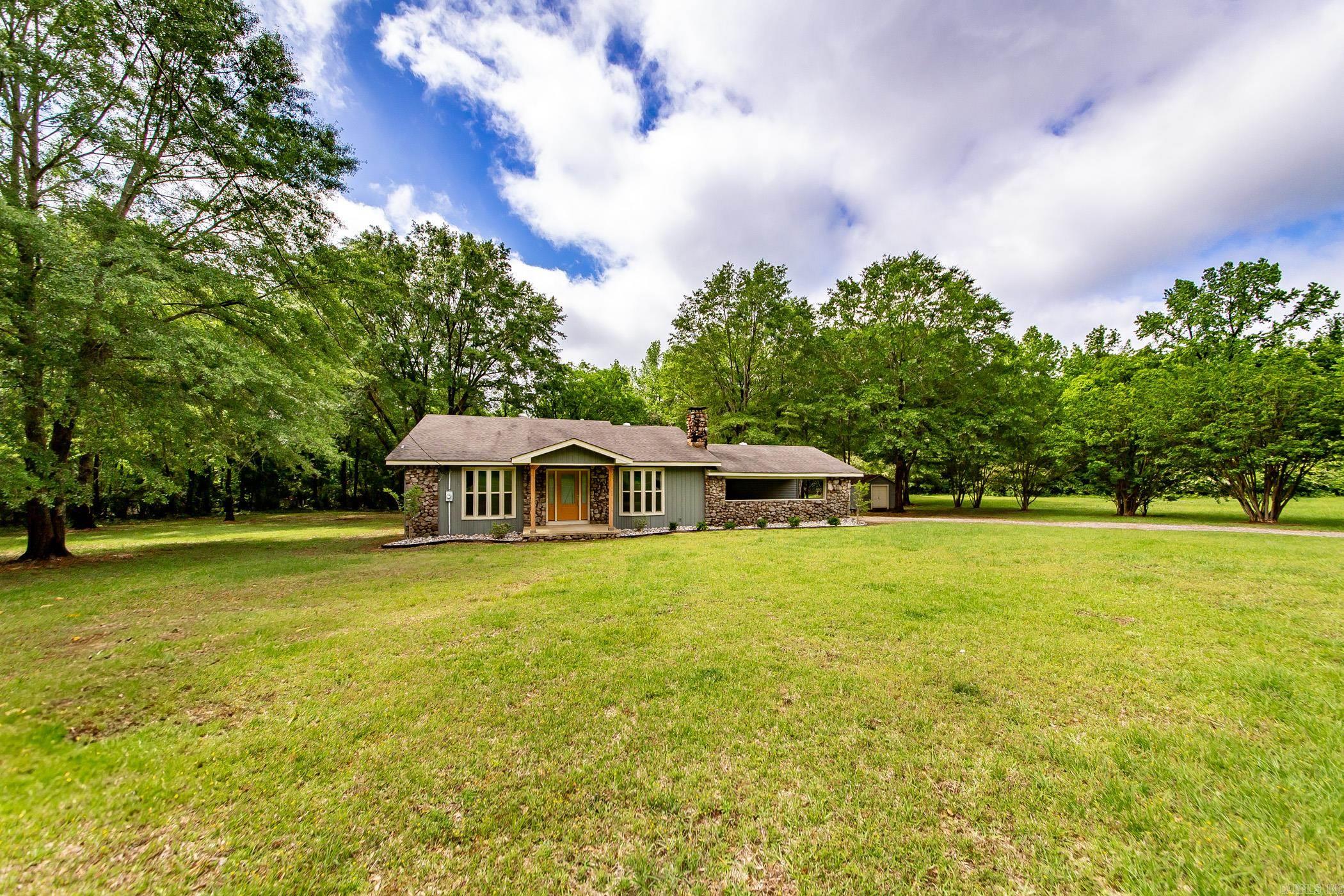 Fully Renovated Home on 8 Wooded Acres Step into modern country living at its finest. This beautifully renovated 3-bedroom, 2-bath home sits on 8 serene, mostly wooded acresāoffering both privacy and upscale comfort. Every detail has been thoughtfully updated: new flooring, custom cabinets, sleek countertops, modern wiring and plumbing, new HVAC, and designer light fixturesāall move-in ready with quality craftsmanship throughout. The owner has also added a brand-new full bathroom, creating a comfortable and functional space for families or guests. A bonus home office off the carport adds flexibility for remote work or creative use. Outside, enjoy the quiet of nature, room to roam, or build out your outdoor lifestyle vision. Whether youāre sipping morning coffee under the trees or entertaining on a crisp fall evening, this property offers the kind of setting people dream of. Located just outside of town with the peace of the countryside and the ease of access to nearby amenities, this home blends timeless charm with modern convenience.