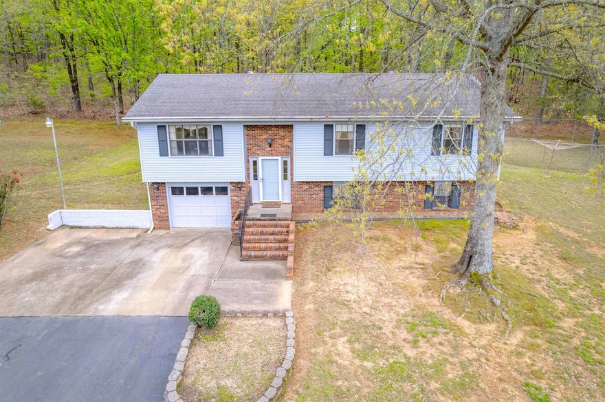 Country Living with City Convenience & Conway Corp Utilities! Nestled on nearly 3 peaceful acres, this well-maintained home offers 4 bedrooms (3 up & 1 down), 3 full bathrooms (2 up & 1 down), 2,377 sqft, two living areas, sunroom/office, screened in porch, shop with electricity, storage building, central vacuum system and more! See feature list for all updates & upgrades completed. Conveniently located just 1.5 miles from I-40, Beaverfork Lake & Park. You’ll enjoy beautiful views of sunrises & wildlife. This property offers serenity and ample space to enjoy the outdoors, so don’t miss out on this rare find and schedule a tour today! Agents see remarks.