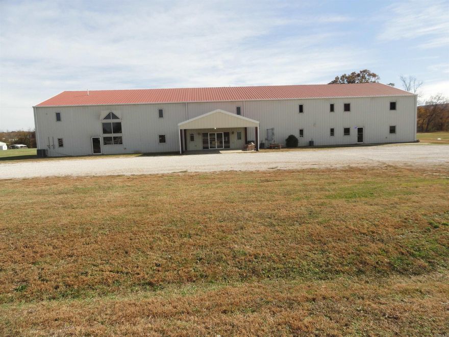 Spacious 16,000 sq ft church building in a prime location in Marshall on 6.36 acres M/L of mostly level land with a little patch of woods that adds to the charm of this property. Church services were held here until October 2025. Property features ample parking, large sanctuary, sound booth, balcony, huge kitchen area, fellowship hall, baptistry, restrooms, offices, & multiple Sunday school rooms. Part of the upstairs area was being used for a women’s faith-based substance abuse rehab program, including bedrooms, bathrooms, office, large living area & space for Bible study, classes or work-out area & bonus rooms. This property would be perfect for continuing as a ministry facility, rehab program or adapting for a new congregation. Outdoor amenities include a basketball court, playground & equip and with 6.36 acres, ample open space for outdoor activities such as volleyball, softball, etc. or building more commercial endeavors. Endless potential for church, community or commercial use—ready for its next purpose!