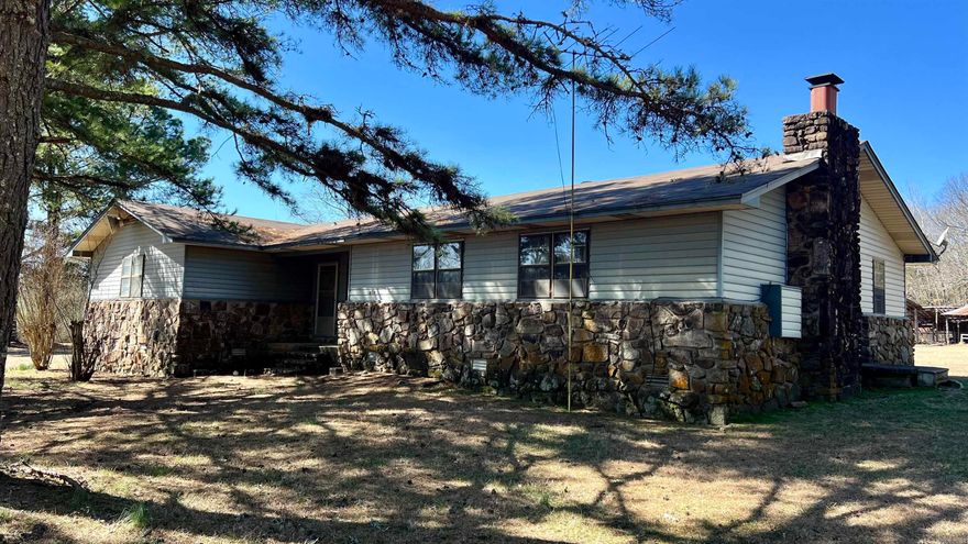 Welcome to your dream country retreat! Sitting on 16.79 acres of lush land, this charming home offers the perfect blend of tranquility and space. The huge front and back yards provide ample room for outdoor activities, and the serene pond adds a touch of natural beauty to the landscape. Inside, you'll find 4 spacious bedrooms and 2 full bathrooms, ideal for accommodating family and guests. The large living room is perfect for gatherings and cozy nights in, while the screened-in porch allows you to enjoy the outdoors comfortably. Whether you're looking for a peaceful escape or a place to entertain, this country home has it all. Don't miss out on this unique opportunity to experience living that small town lifestyle you’ve always dreamed of! Seller elects to sell the property as is in its current condition.