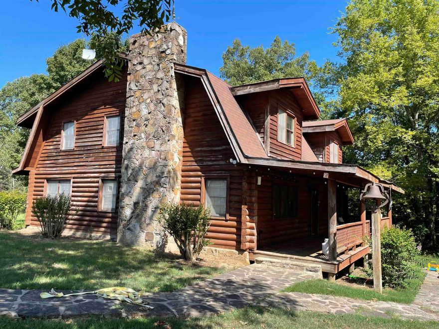 Two homes (log home 2,640 sq ft) (rock home 2,246 sq ft) 50 acres +/-. This was an active Cattle farm with all necessary equipment to do everyday chores. Health issues is the reason for this SALE!!! Large shop is insulated w/concrete floor. All equipment will convey, loading pens, lots of extra pens, spare gates, fuel tank (200 gal) ect. Both homes have wood burning fire places.