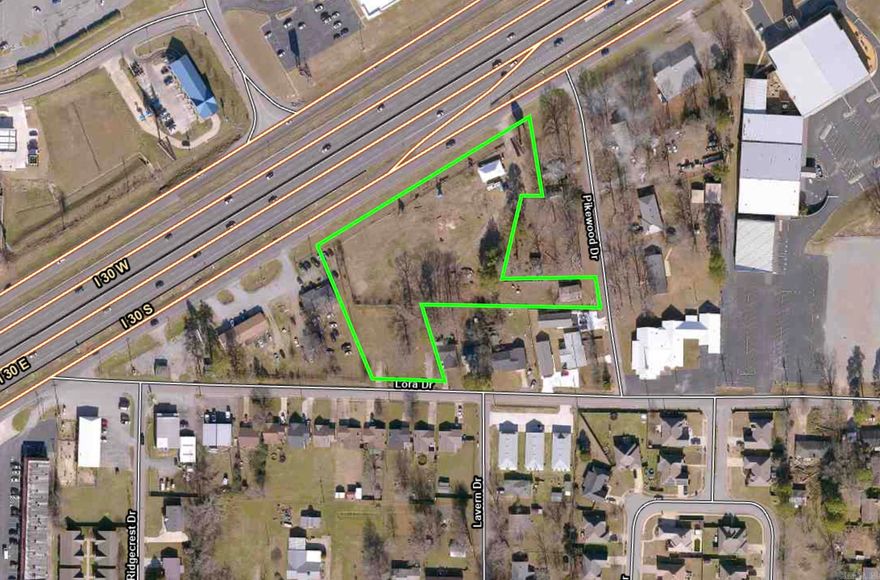 Commercial lot located on I-30! Great visibility. Property includes multiple Lots on both Pikewood Drive and Lora Drive. Call for more details.