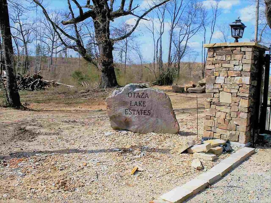 Amazing views from this beautiful home site in gated community with private lake.  Highest lot in the subdivision with the best views of mountains and lake.     Restricted to a minimum of 1350sqft.