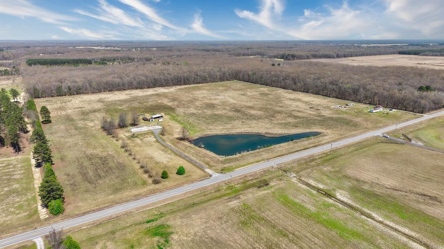 Beautiful pastureland with a pond and barn.  This 29.90 acre farm has many building sites to choose from. Abundance of wildlife.  Bring your livestock and enjoy country living at its finest.  Small box trailer does not convey and will be removed.