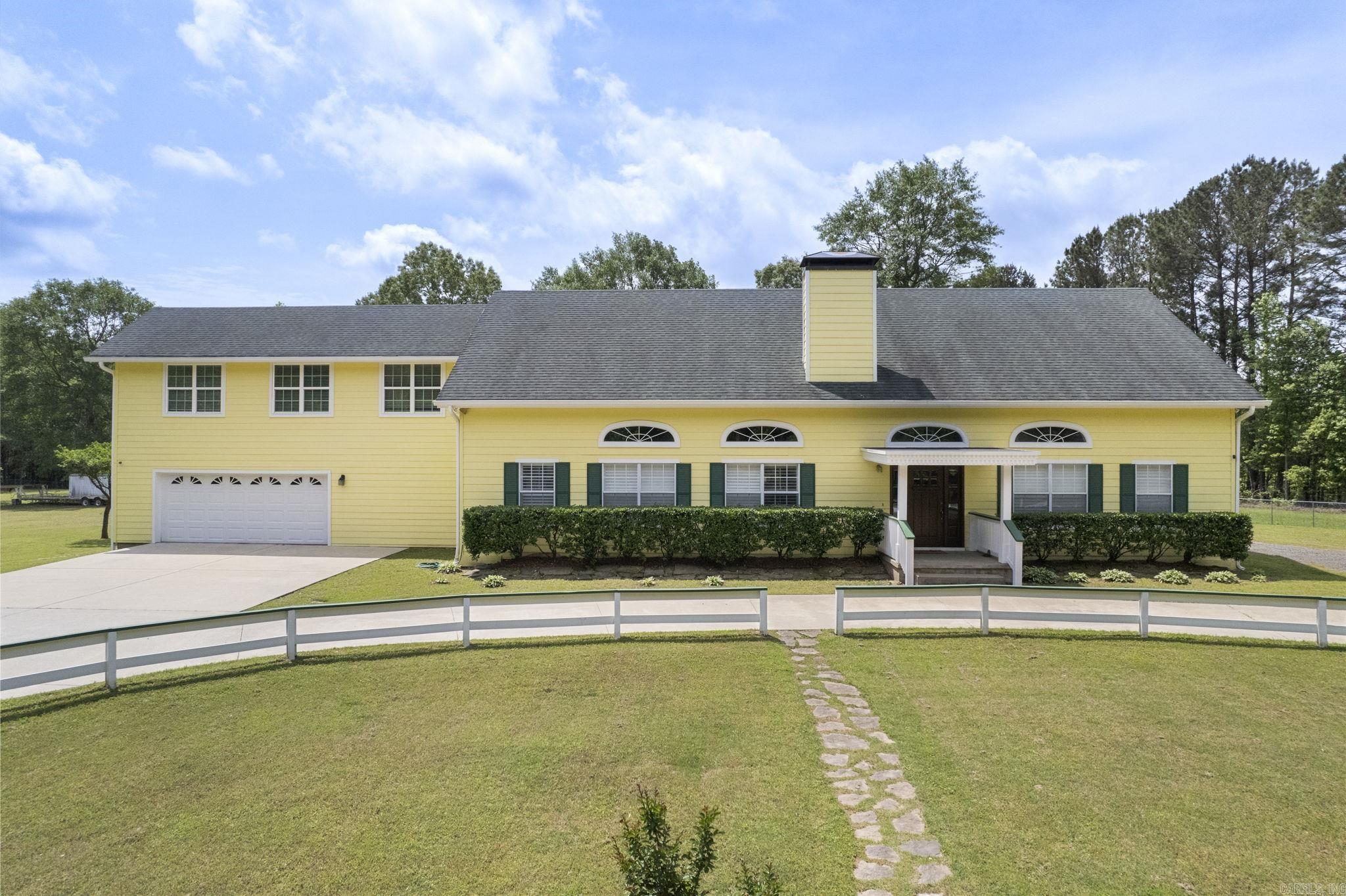 Nestled on over 4 acres of land within the highly sought-after Bryant School District, this spacious family home offers the perfect blend of comfort and convenience. Boasting a large kitchen equipped with modern stainless-steel appliances, beautiful granite countertops, a chef-quality gas range, double ovens, and a massive pantry, this home is perfect for both cooking and entertaining. Upon entering the home, you are greeted with a huge family room that features vaulted ceilings and a cozy fireplace, creating a warm, welcoming atmosphere. The master suite is an oasis with a garden tub, custom closets, and a private deck overlooking the property. With plenty of room for everyone, the home includes a private office, a family room for relaxation that leads to an upper deck overlooking the pool, and generous living spaces throughout. The attached 2-car garage provides ample storage, and the expansive backyard is a true oasis. Step outside to enjoy your own in-ground gunite swimming pool—ideal for those hot summer days. Whether you’re hosting gatherings or enjoying quiet family moments, this home offers everything you need for a comfortable lifestyle.