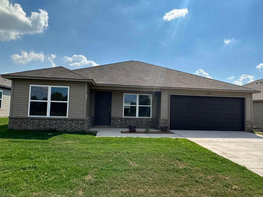 Carnegie II plan Upgrades included in this home: 8" deep Kitchen sink, 50 gallon water heater, Luxury Vinyl Plank flooring in wet areas and Living Room and adjacent hallways and all bedrooms including closets, garage door opener motor, full width vanity mirrors, faux wood blinds throughout home, Cheyenne style interior doors throughout home, LED disk lights in Kitchen, ceiling fan in Living Room, stainless steel appliance package