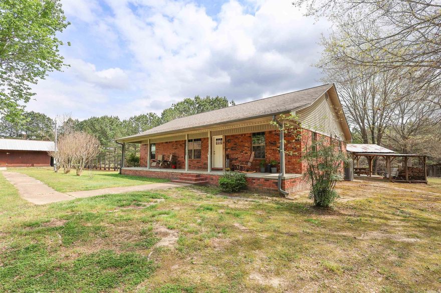 Located down a tranquil country road. This beautiful home is situated on 5 acres and is only a short drive to both Crater of Diamonds State Park and Lake Greeson. If you are looking for a beautiful, quiet, peaceful get-a-way, you have found it!