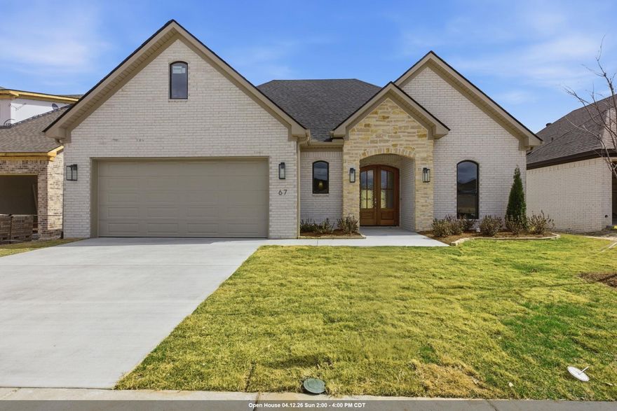 Be among the first to plant roots in this highly anticipated development with the stunning new construction at 67 Mountain Brook. This home is move-in ready!   This thoughtfully designed single-level floor plan offers the perfect blend of style and function, featuring 3 full spacious bedrooms, 2.5 baths, and a dedicated home office that could be used as an additional bedroom or playroom. Make it your own!  The heart of the home is an expansive open-concept living area that flows seamlessly into a private, low-maintenance, outdoor oasis. Imagine cozy evenings on your covered patio, complete with its own outdoor fireplace! The primary suite is a true retreat, featuring a spa-like bath with a freestanding tub, dual vanities, and a massive walk-in closet that connects directly to the laundry room for ultimate convenience.  This home is located in Mountain Brook, a brand new community located off of HWY 10, minutes from top schools, dining, and outdoor activities.