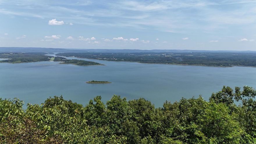 WHAT A VIEW!!  This 5.33/acre lot, off of Diamond Bluff Road looking out over the big water and down the Narrows. The views seem to be endless. The property is the sight of a home that caught fire.  The home was over 3000sf. The debris has been cleared and it is ready for you to build your dream home.  The property already has a gated driveway, septic, water, land scaping, and power at the site.